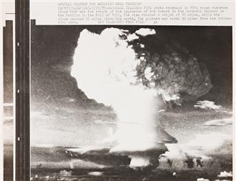 (COLD WAR--NUCLEAR BOMB TESTING) A group of 28 select press prints related to post-war atomic bomb testing, primarily in the United Sta